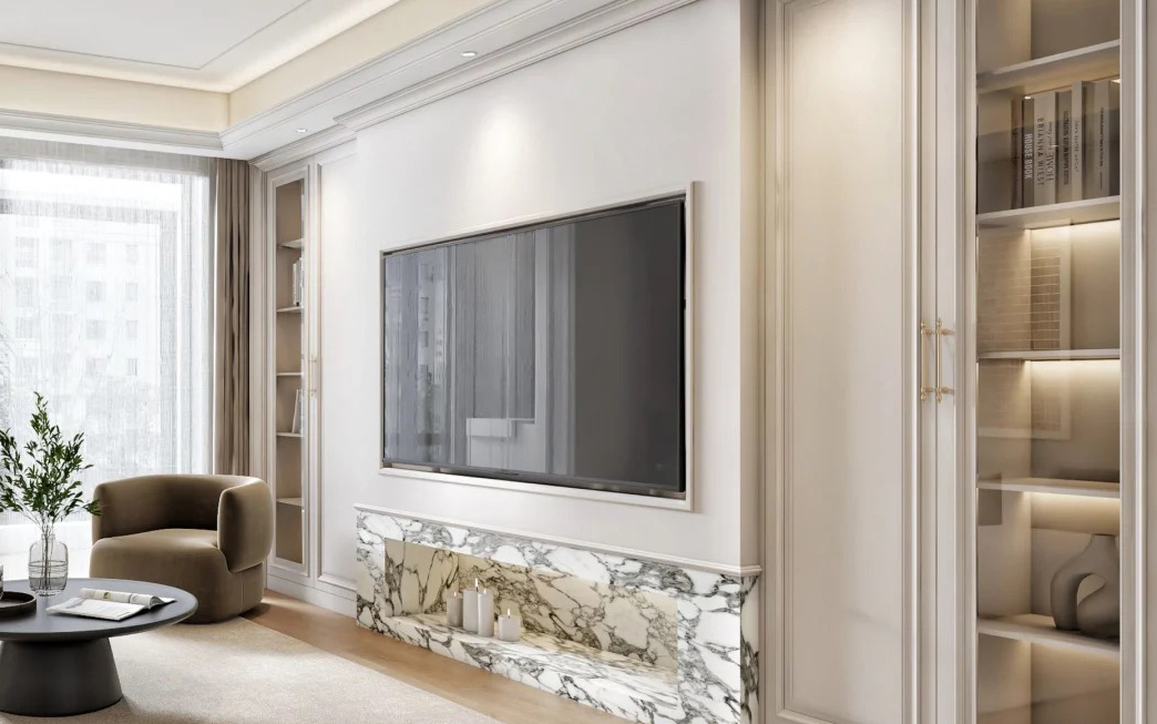 Hệ vách Tivi phẳng tiệp màu tường kết hợp hốc đá marble xám và đèn LED hắt nhẹ mang lại vẻ đẹp trọn vẹn tinh tế.